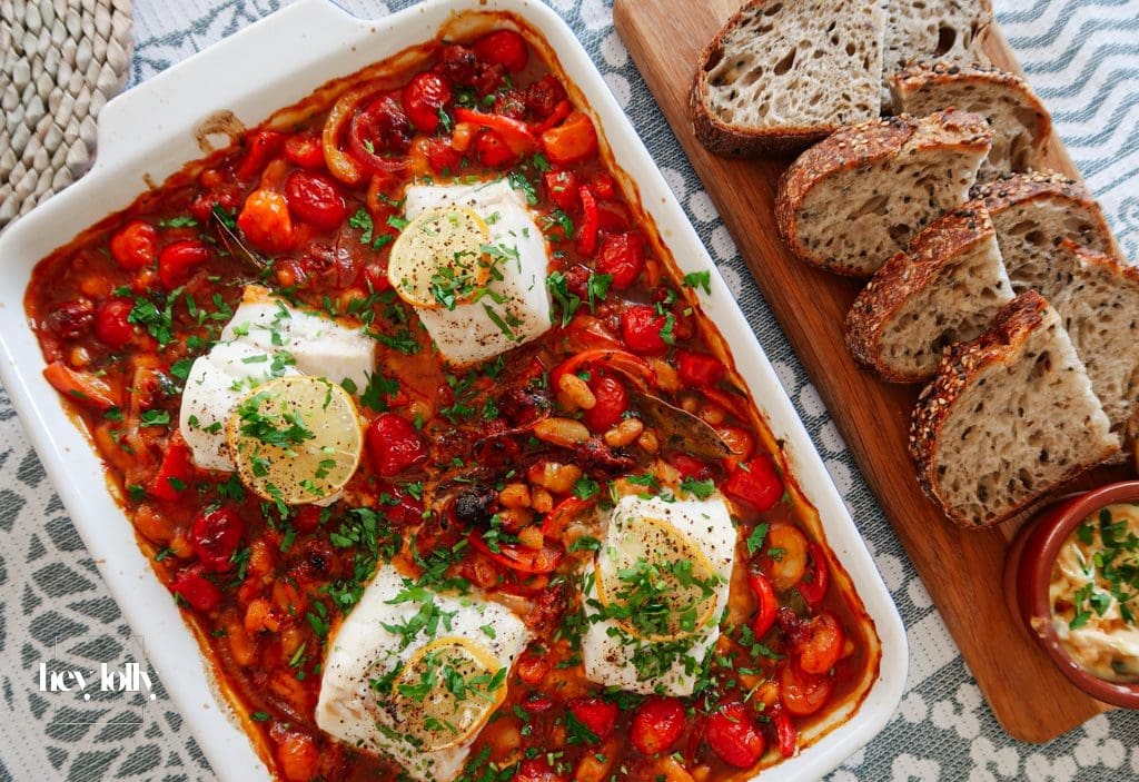 Baked cod with chorizo in a lemony tomato and pepper stew.
