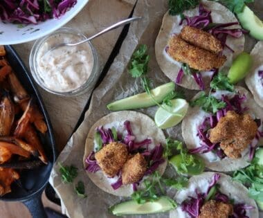 crispy cod tacos overhead shot with sweet potatoes chilli cream and slaw