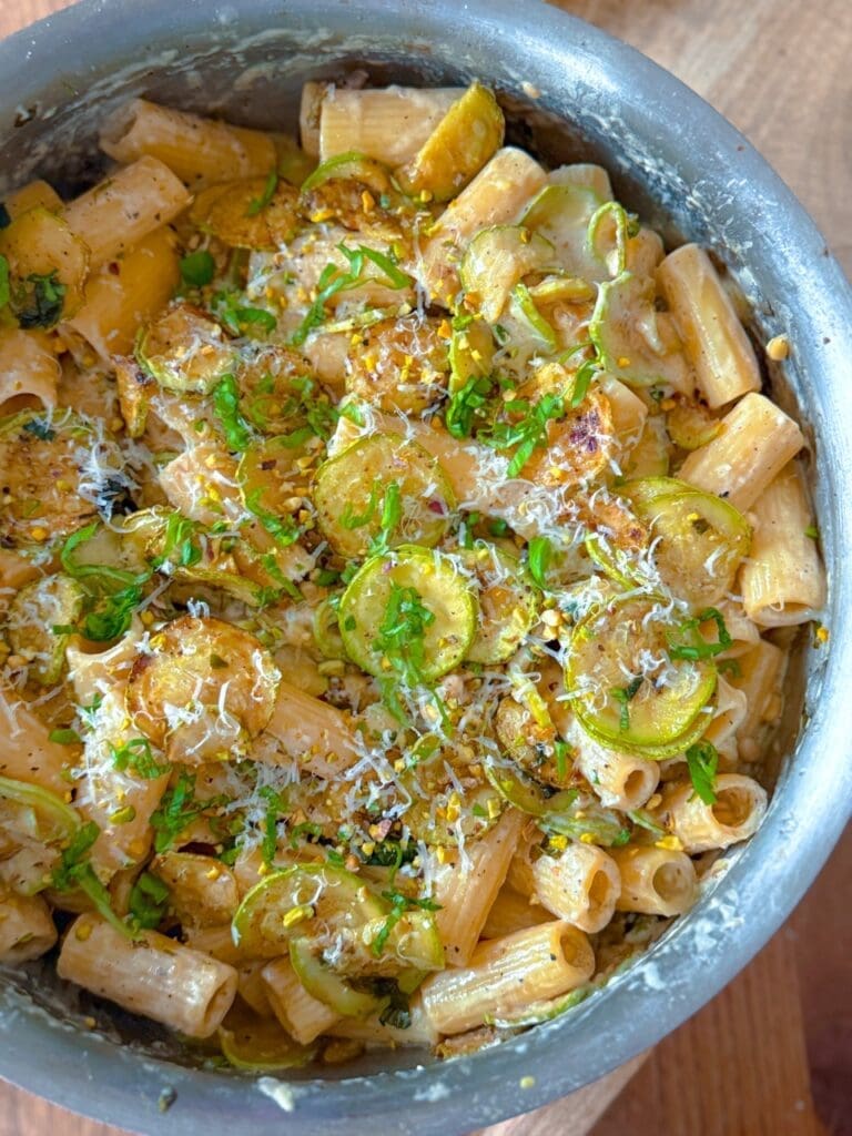 overhead shot of courgette lemon ricotta rigatoni pasta