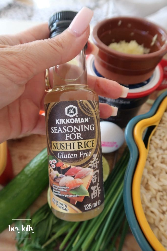 Ingredients for Korean Crab Fried Rice: day-old brown rice, gochujang, crab, lime, herbs.