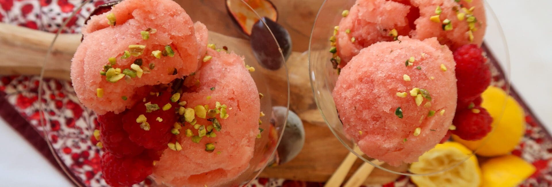 Close-up of no-churn nectarine and passion fruit sorbet, served with passion fruit pulp