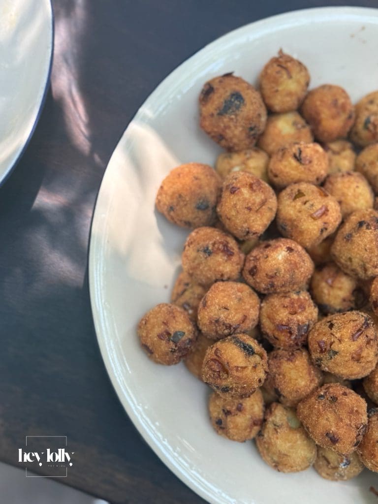 Golden fried Sicilian rice and vegetable balls prepared fresh during the cooking class in Siracusa.