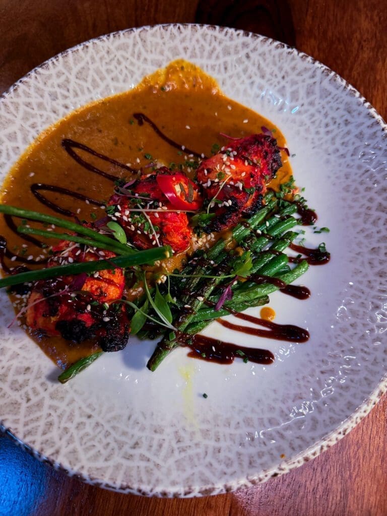 Tandoori Monkfish at Passan’s Nottingham — thick fillets with proper char, served with spiced sauce and fresh herbs.