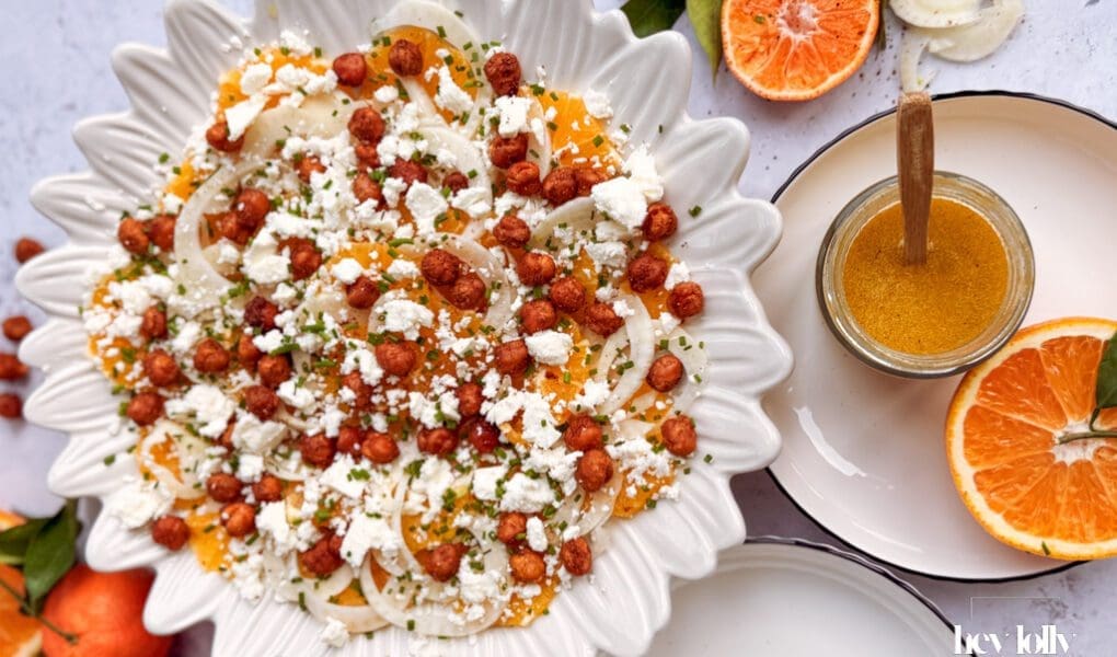 overhead shot of orange, fennal and crispy chickpea salad with feta