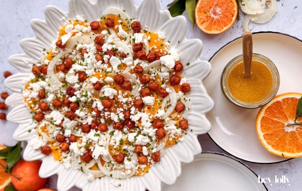 overhead shot of orange, fennal and crispy chickpea salad with feta