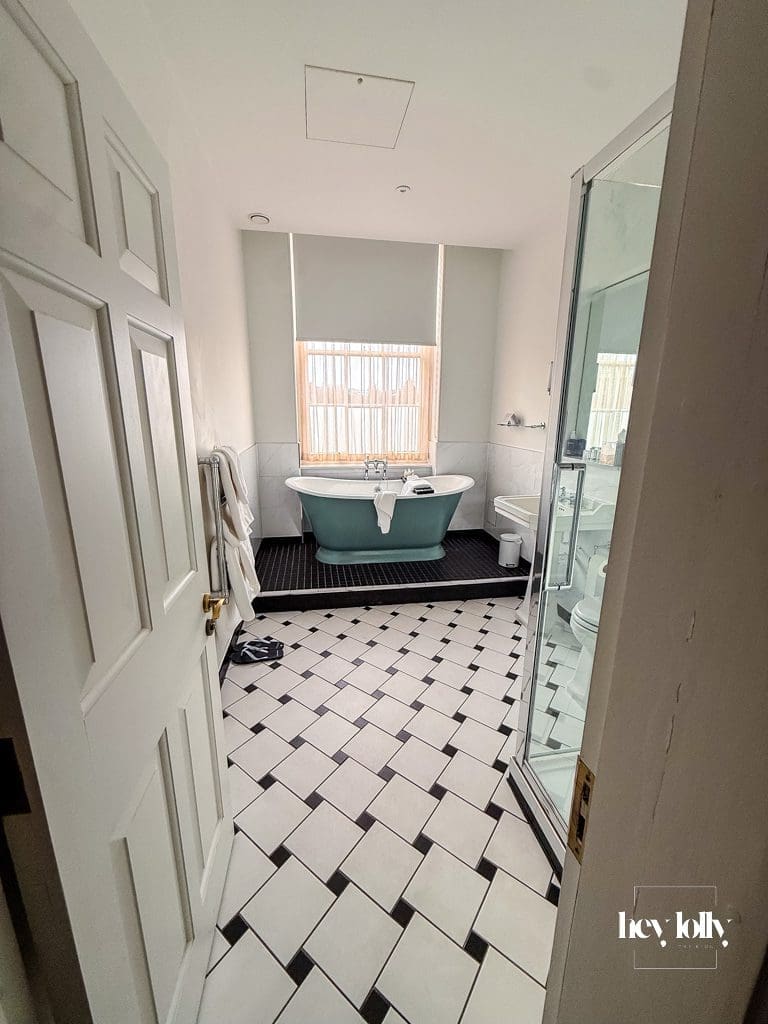 Luxury bathroom at Buxton Crescent Spa Hotel featuring deep soaking bathtub