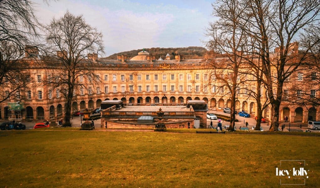 Historic colonnade and stone architecture of Buxton Crescent in the Peak District