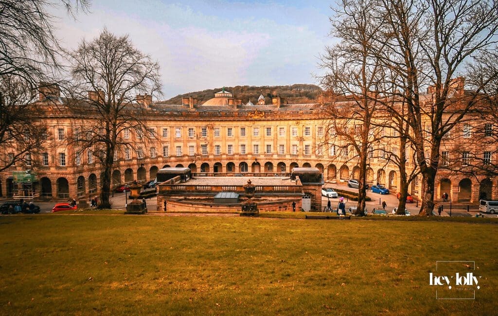 Historic colonnade and stone architecture of Buxton Crescent in the Peak District