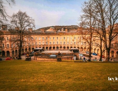 Historic colonnade and stone architecture of Buxton Crescent in the Peak District