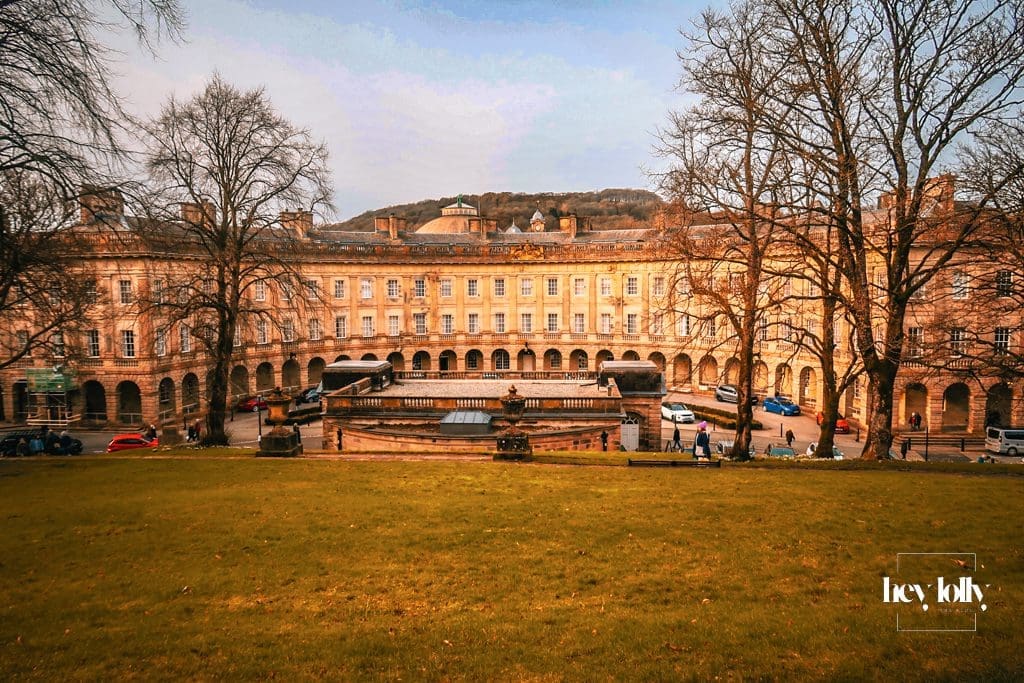Historic colonnade and stone architecture of Buxton Crescent in the Peak District