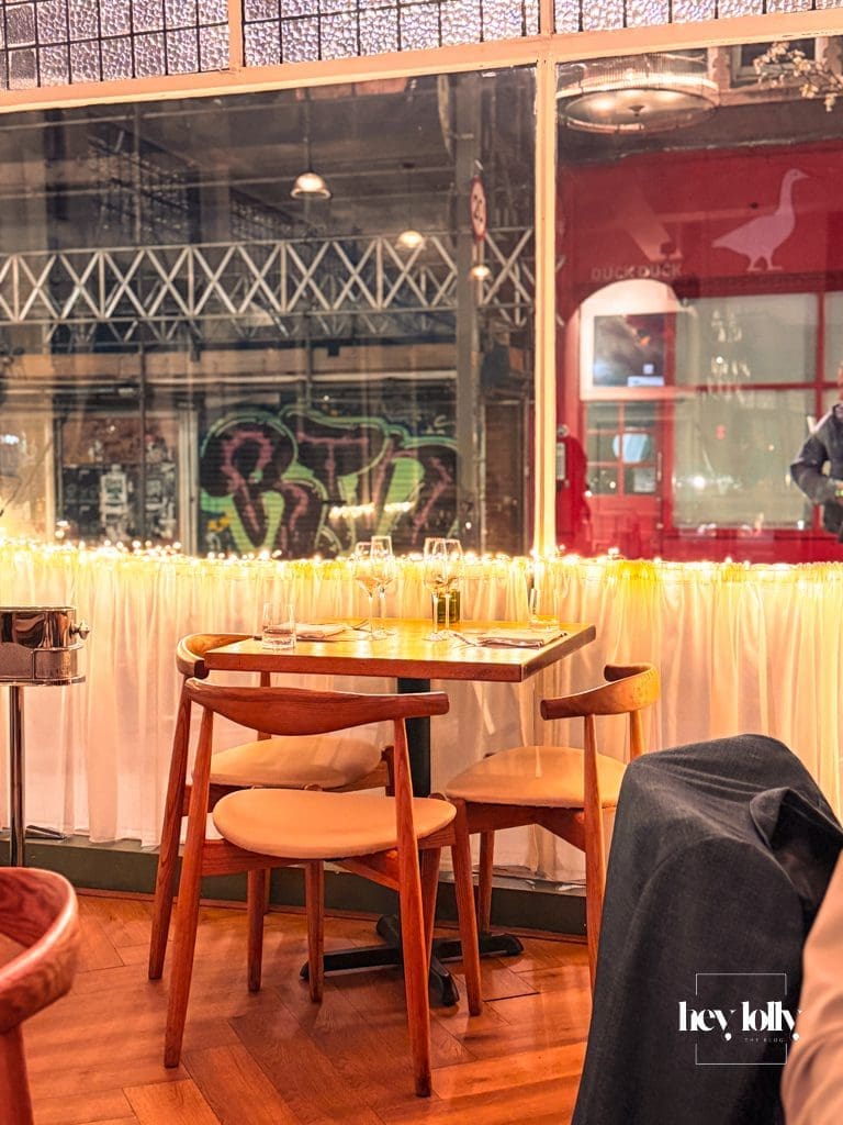 Elegant candlelit table setting inside Skein in Nottingham during an intimate evening dinner