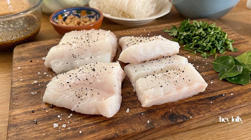 Fresh cod fillets prepared for pan-seared gochujang cod noodle bowl.