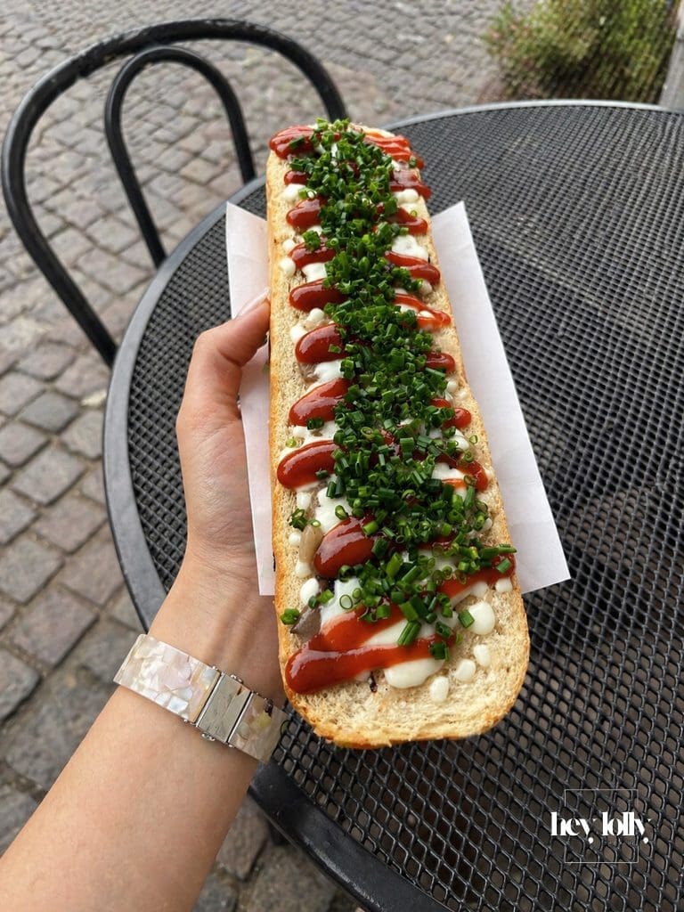 Classic zapiekanki in Krakow with cheese ketchup and chives