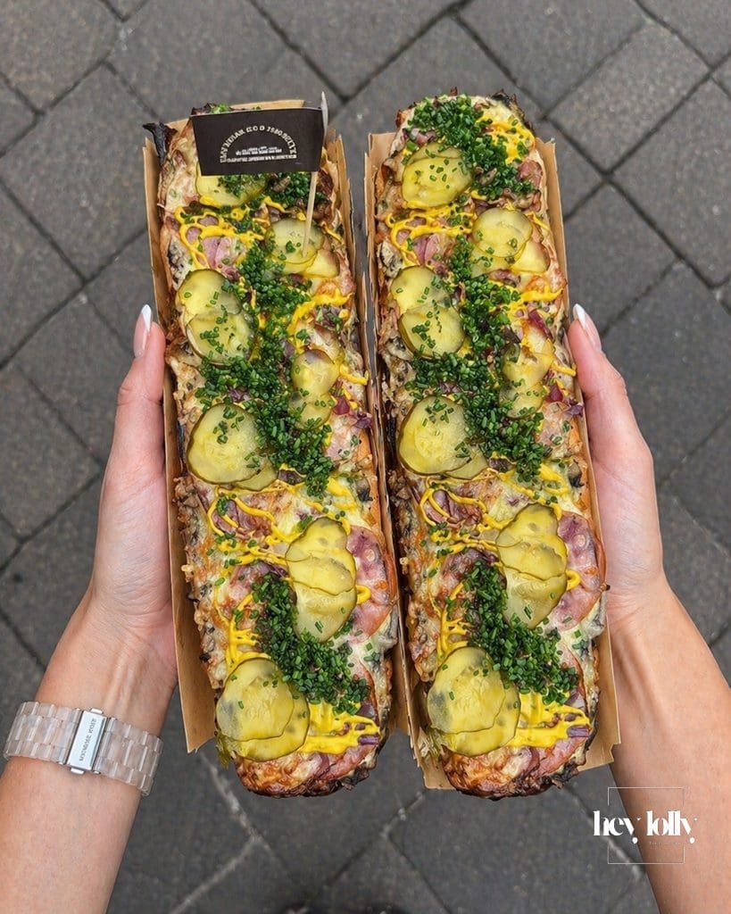 Two loaded zapiekanki from Zapiekanki Krolewskie with pickles mustard and chives