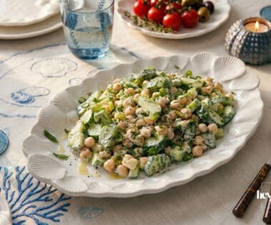 Summer tzatziki chickpea bowl with cucumber, herbs and yogurt dressing served fresh