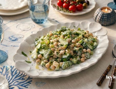Summer tzatziki chickpea bowl with cucumber, herbs and yogurt dressing served fresh