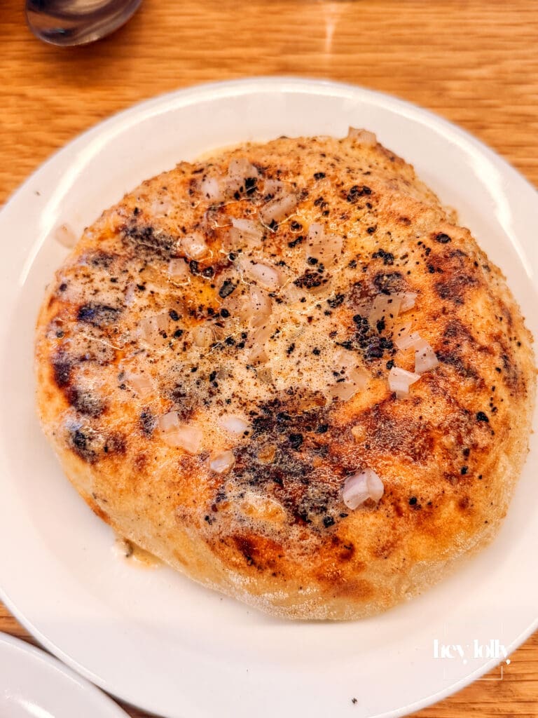 Grilled flatbread with whipped beef fat and urfa chilli served at Erst Manchester – Erst Manchester review