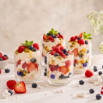 summer pavlova cups filled with fresh berries