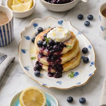 lemon ricotta pancakes overhead shot with bllueberry compote