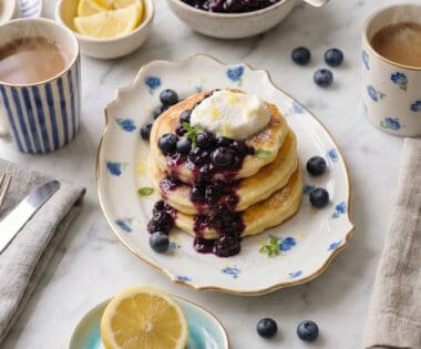 lemon ricotta pancakes overhead shot with bllueberry compote