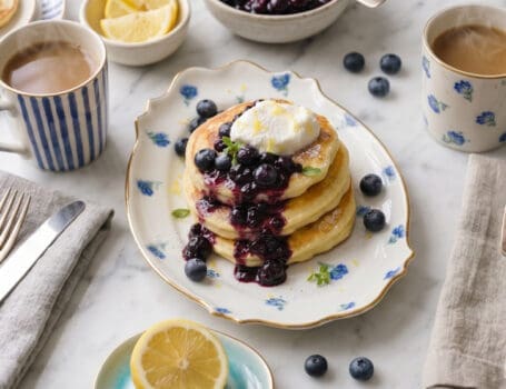 lemon ricotta pancakes overhead shot with bllueberry compote