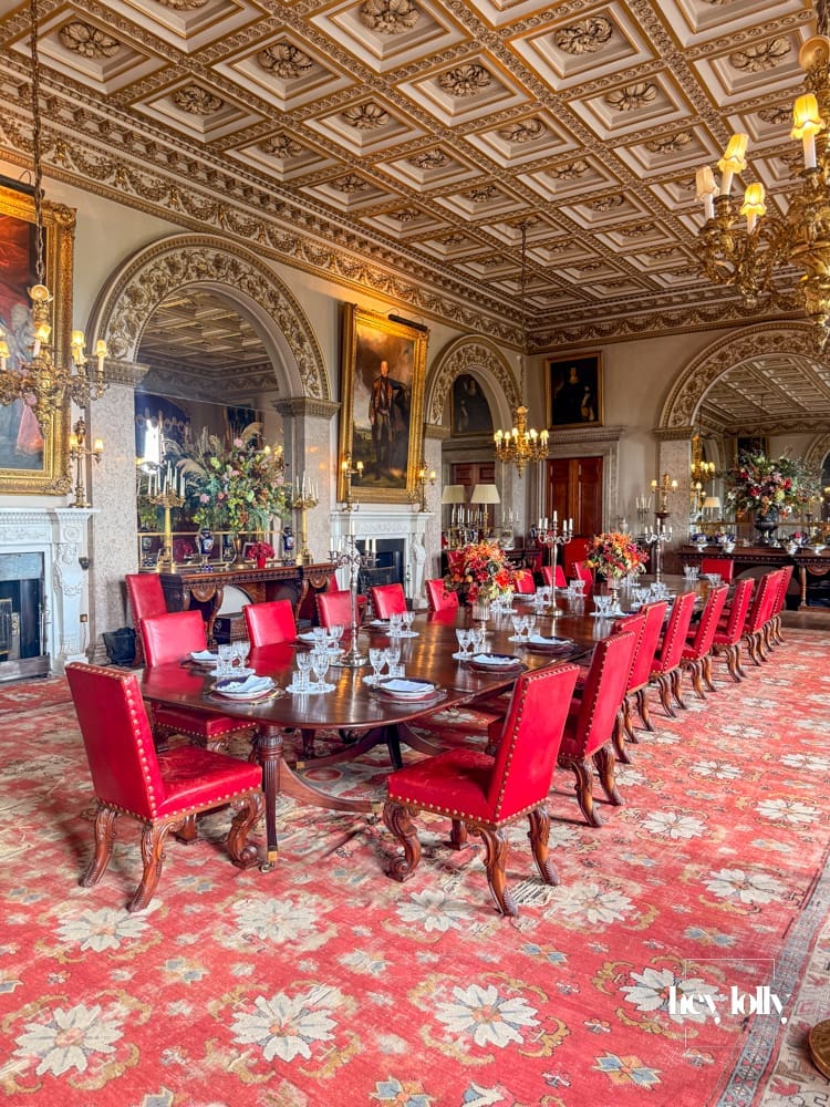 Historic interior room at Belvoir Castle with fireplace and ornate walls