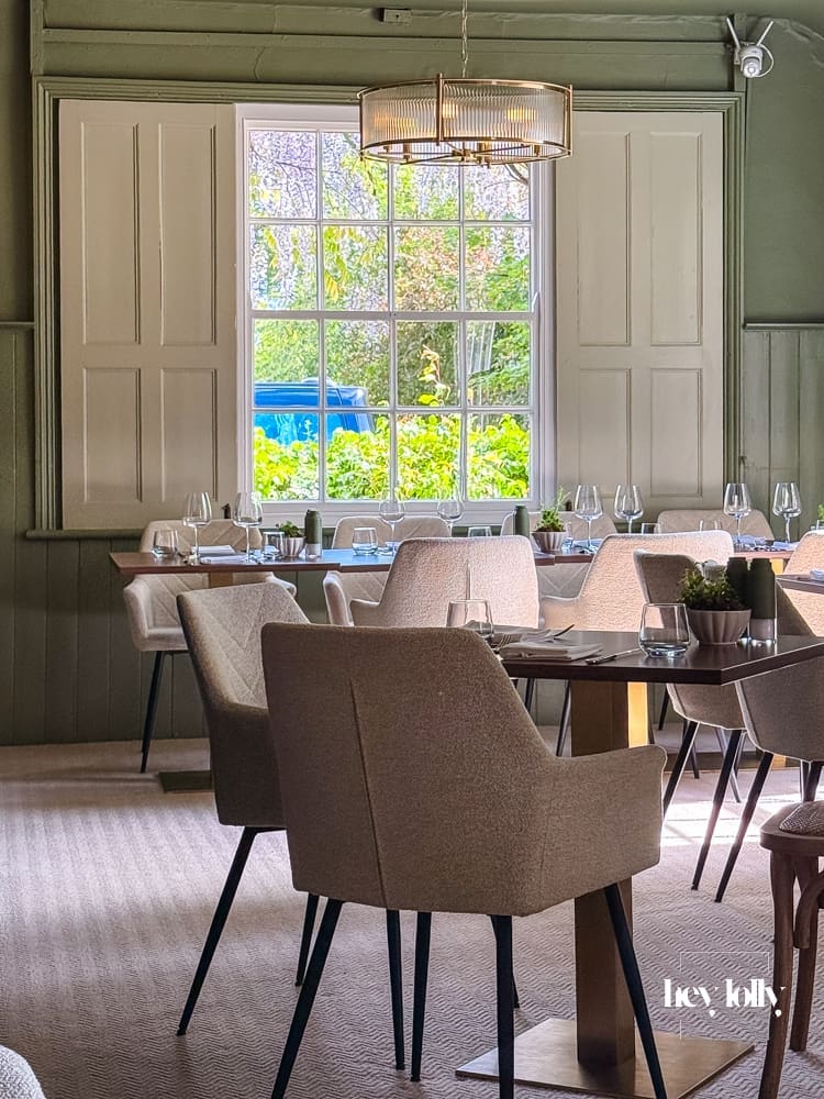 Sunday lunch table at The Martins Arms in Colston Bassett with wine and menu