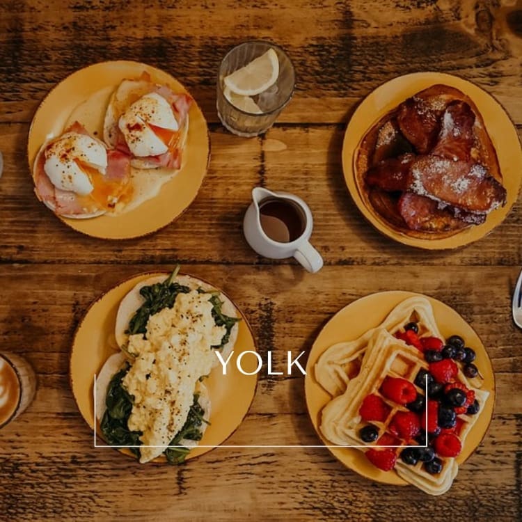 Modern brunch plates and coffee at Yolk Nottingham
